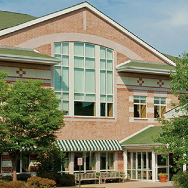 Exterior shot of an archway outside of an Erickson community building.